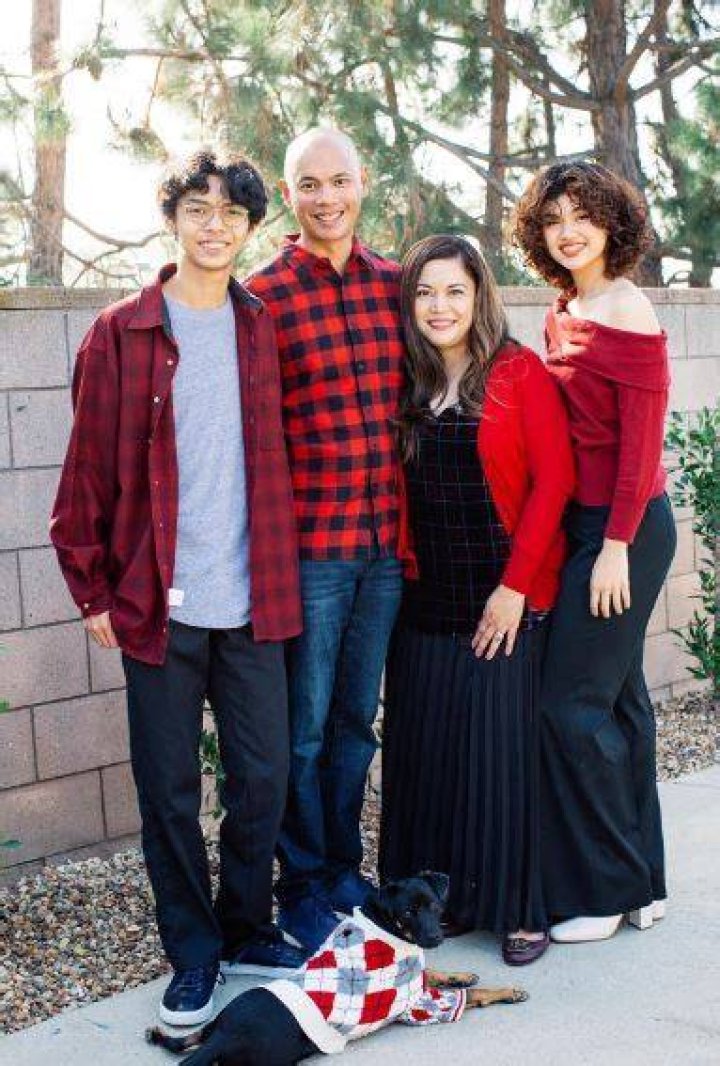 Sam Morelos with her parents and brother